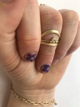 Load image into Gallery viewer, A close-up image of a handcrafted yellow gold wedding band with a high arch and rustic texture. Made with recycled ethical gold and stamped with 10k, 14k, or 18k. Available in a range of sizes.