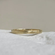 Load image into Gallery viewer, Handcrafted thin rustic yellow gold wedding band with minimal texture, ethically sourced and available in a range of sizes