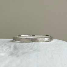 Load image into Gallery viewer, Brushed hammered sterling silver wedding band with delicate, freestyle hammered texture and minimalist design. Made to order with recycled, ethical silver. Gift wrapped