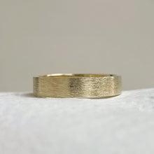 Load image into Gallery viewer, Handcrafted rustic yellow gold wedding band with a brushed texture, made from recycled 10K, 14K, or 18K gold. Perfect for weddings or as a gift for him. Available in a range of sizes.