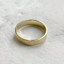 Load image into Gallery viewer, Handcrafted rustic yellow gold wedding band with a brushed texture, made from recycled 10K, 14K, or 18K gold. Perfect for weddings or as a gift for him. Available in a range of sizes.
