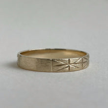 Load image into Gallery viewer, Image of a 4mm yellow gold geometric wedding band, handcrafted with recycled ethical gold, stamped and hallmarked