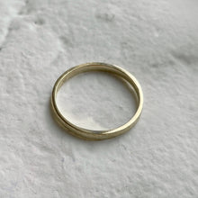 Load image into Gallery viewer, Handcrafted thin rustic yellow gold wedding band with minimal texture, ethically sourced and available in a range of sizes
