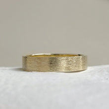 Load image into Gallery viewer, Handcrafted rustic yellow gold wedding band with a brushed texture, made from recycled 10K, 14K, or 18K gold. Perfect for weddings or as a gift for him. Available in a range of sizes.
