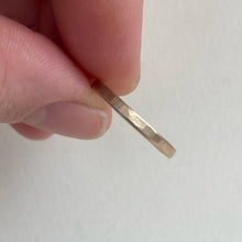 Load image into Gallery viewer, Handcrafted thin hammered brushed finish yellow gold wedding band with a freestyle hammered texture