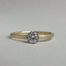 Load image into Gallery viewer, Rustic rose setting white sapphire engagement ring on a yellow gold band
