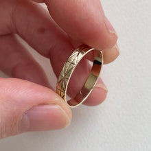 Load image into Gallery viewer, Image of a 4mm yellow gold geometric wedding band, handcrafted with recycled ethical gold, stamped and hallmarked