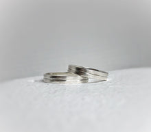 Load image into Gallery viewer, Rustic wedding band set - Wedding bands his and hers - Wedding bands - Handcrafted in ethically sourced sterling silver - Men’s wedding bands.