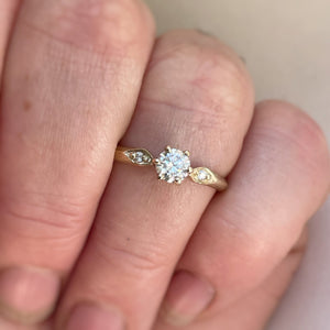 Vintage inspired solitaire engagement ring. 14kt yellow gold, 10kt yellow gold