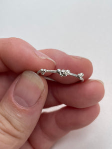 scs recycled sterling silver sweet granulation design in hand on white background ethically made