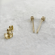 Load image into Gallery viewer, Handcrafted 10kt yellow gold rose bud stud earrings with two round white sapphires. These minimalist earrings are ready to ship and come gift-wrapped.
