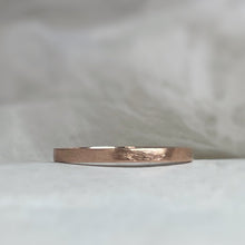 Load image into Gallery viewer, Handcrafted 2mm rose gold wedding band with minimal rustic texture made from recycled ethical gold
