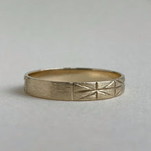 Load image into Gallery viewer, Image of a 4mm yellow gold geometric wedding band, handcrafted with recycled ethical gold, stamped and hallmarked

