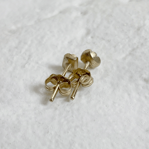 Minimalist geometric stud earrings in 10kt yellow gold, perfect for everyday wear. These handmade earrings are ready to ship and come gift-wrapped