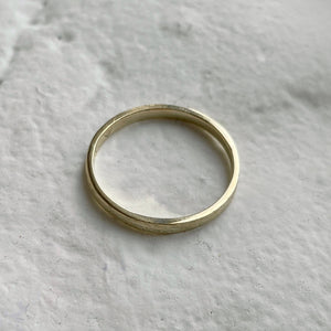 Handcrafted thin rustic yellow gold wedding band with minimal texture, ethically sourced and available in a range of sizes