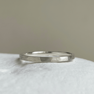 Elegant wedding bands with freestyle hammered texture
