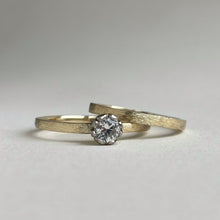 Load image into Gallery viewer, Rustic rose setting white sapphire engagement ring on a yellow gold band
