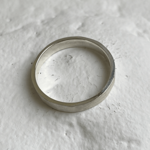 Handcrafted brushed hammered wedding bands - Top view