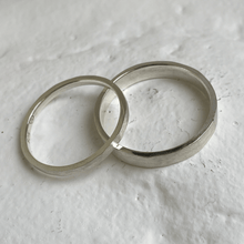 Load image into Gallery viewer, Handcrafted brushed hammered wedding bands - Top view
