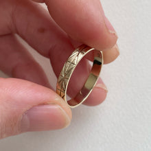 Load image into Gallery viewer, Image of a 4mm yellow gold geometric wedding band, handcrafted with recycled ethical gold, stamped and hallmarked
